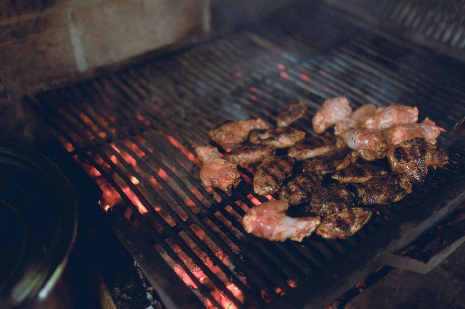 Jerk Chicken — Chicken marinated in allspice and scotch bonnet, then grilled.