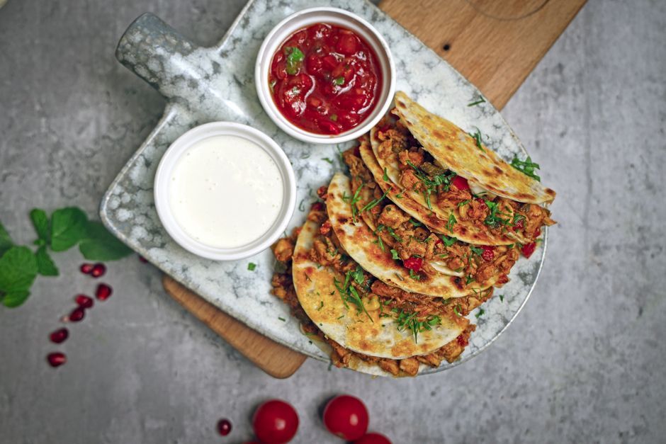 Quesadillas — Tortilla folded over melted cheese and filling, griddled.